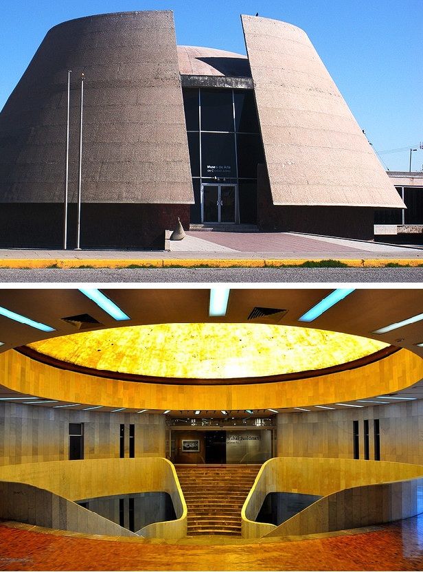 Gran escultura moderna y naranja en frente del edificio de bellas artes en UTEP